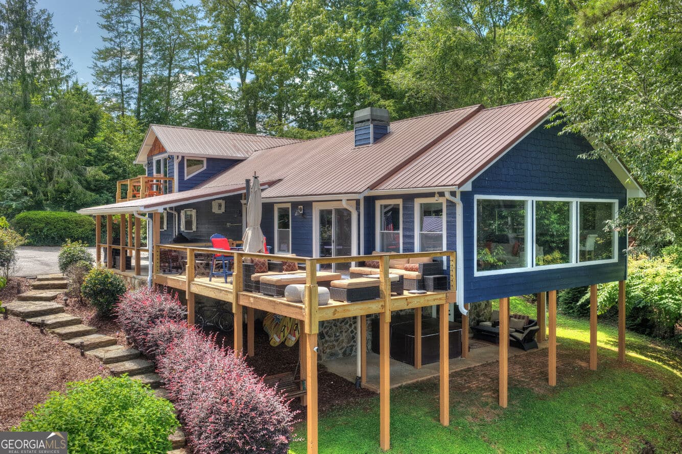 4 bedroom, 4.5 bathroom, 3,272 sq ft single family residence for sale at 209 Marina Drive, Blue Ridge, GA 30513 — photo 1 of 75