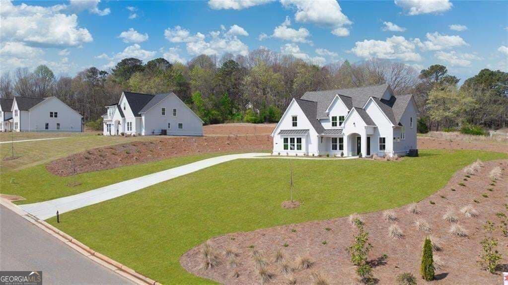 5 bedroom, 4.5 bathroom, 3,789 sq ft single family residence for sale at 8290 Creekside Overlook Drive, Gainesville, GA 30506 — photo 3