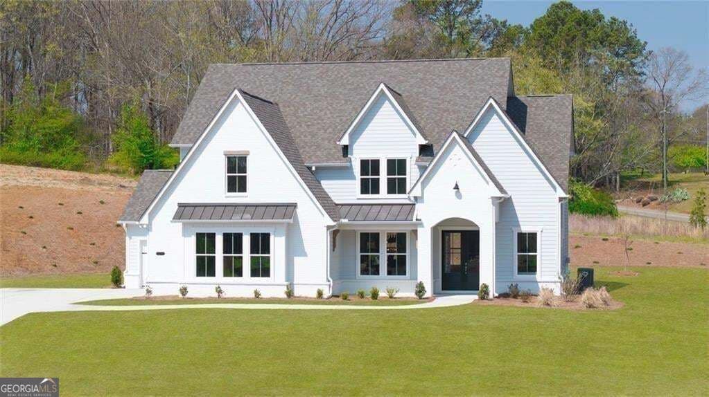 5 bedroom, 4.5 bathroom, 3,789 sq ft single family residence for sale at 8290 Creekside Overlook Drive, Gainesville, GA 30506 — photo 4