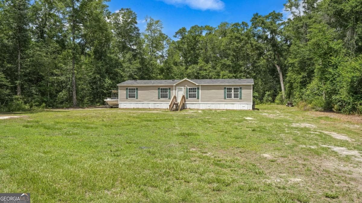 4 bedroom, 2 bathroom, 1,736 sq ft single family residence for sale at 64 Sierra Road Extension, Jesup, GA 31545 — photo 2