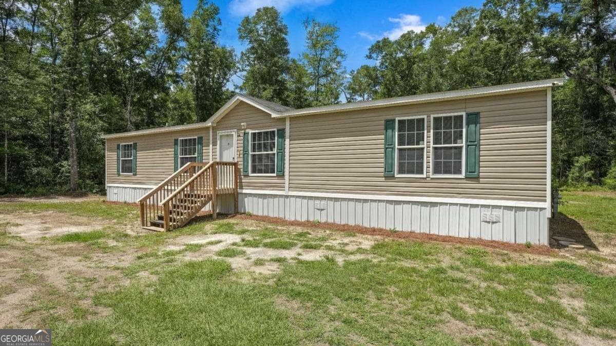 4 bedroom, 2 bathroom, 1,736 sq ft single family residence for sale at 64 Sierra Road Extension, Jesup, GA 31545 — photo 3