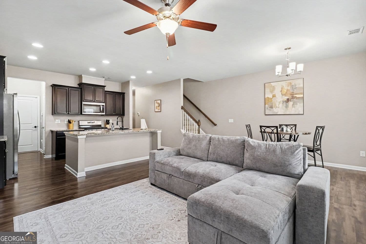 3 bedroom, 2.5 bathroom, 1,784 sq ft townhouse for sale at 6131 Centennial Run, Atlanta, GA 30349 — photo 2