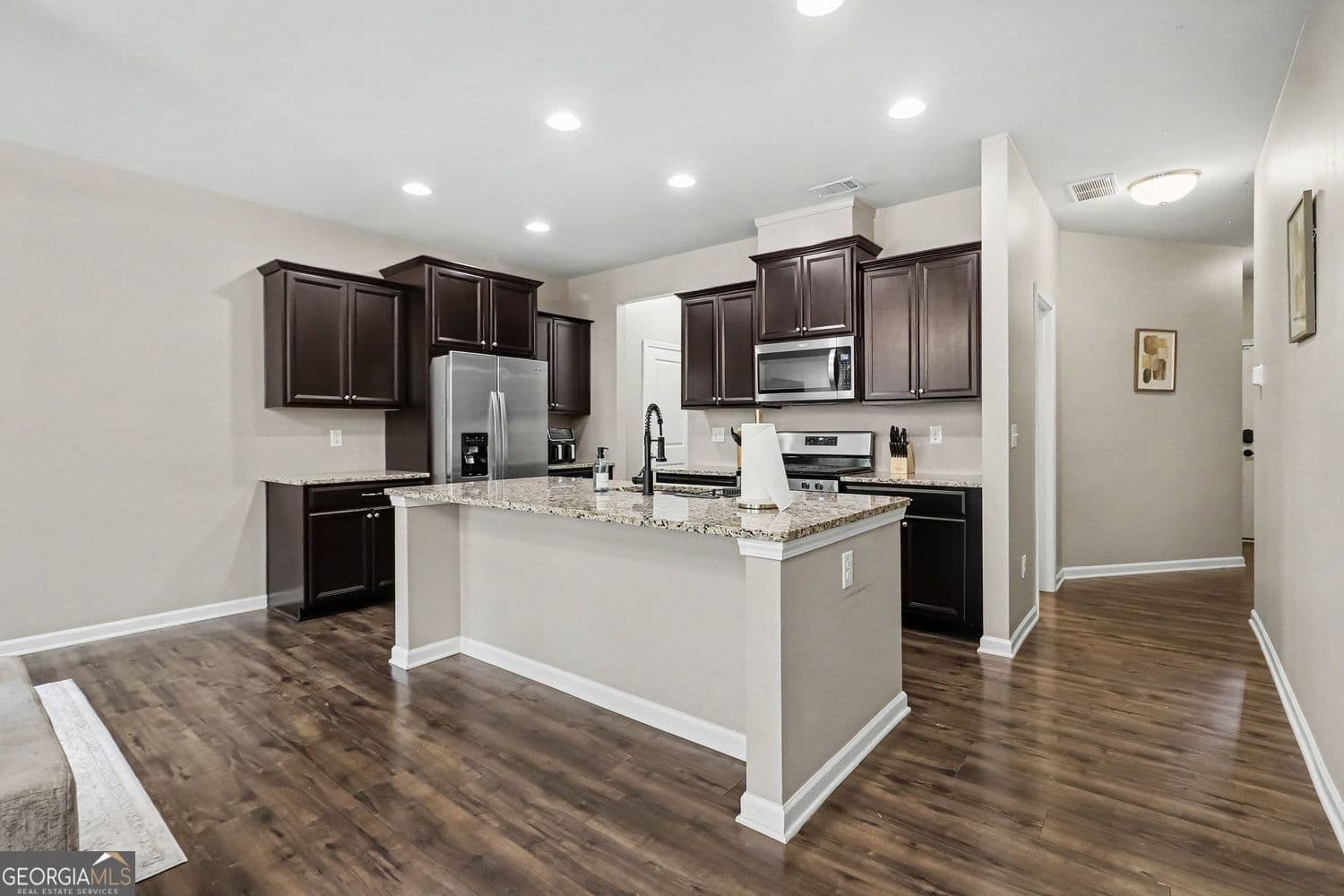 3 bedroom, 2.5 bathroom, 1,784 sq ft townhouse for sale at 6131 Centennial Run, Atlanta, GA 30349 — photo 7