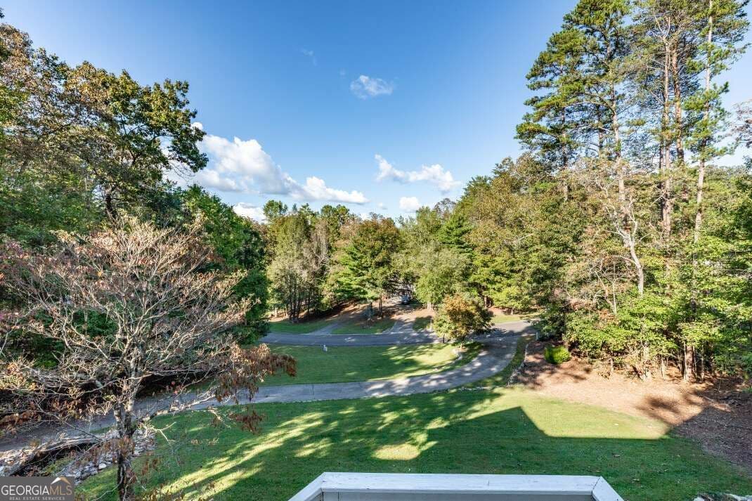 3 bedroom, 2.5 bathroom, 3,532 sq ft single family residence for sale at 409 Owensby Mill Drive, Ellijay, GA 30536 — photo 3