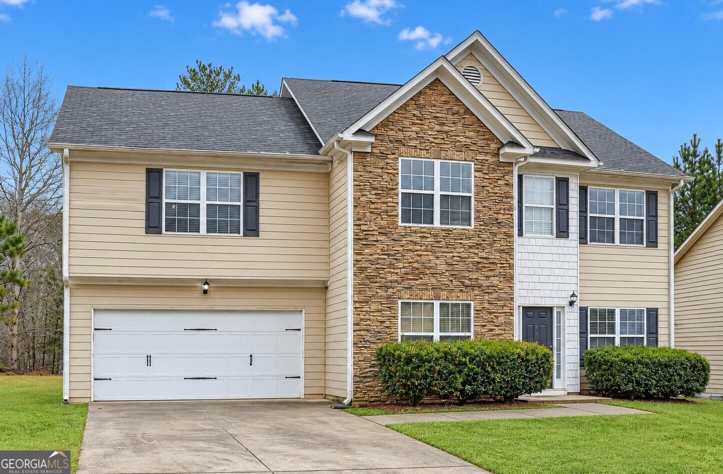 4 bedroom, 2.5 bathroom, 2,780 sq ft single family residence for sale at 5167 Upper Elm Street, Atlanta, GA 30349 — photo 2