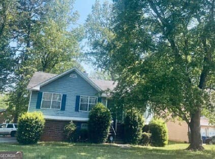4 bedroom, 3 bathroom, 1,852 sq ft single family residence sold at 6012 Happy TRLS Court, Lithonia, GA 30058