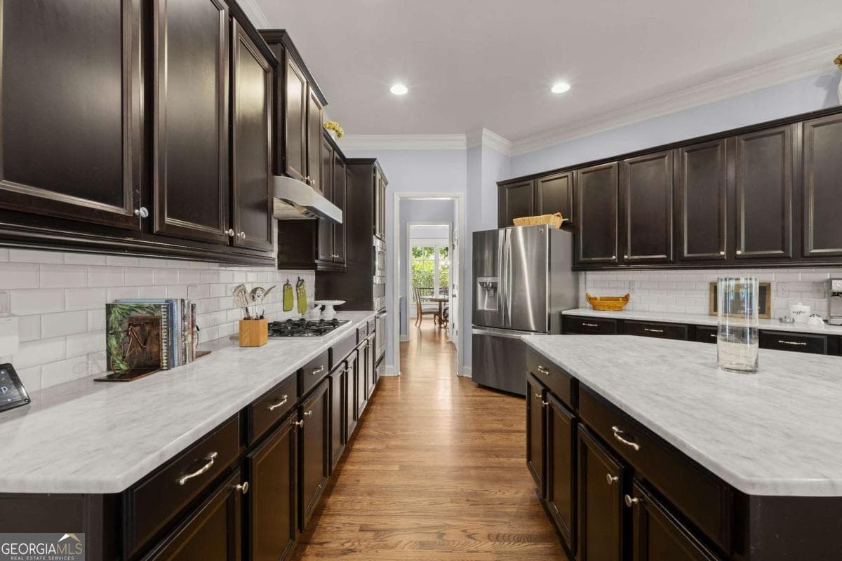 6 bedroom, 5 bathroom, 5,240 sq ft single family residence for sale at 11880 Old Station Place, Alpharetta, GA 30004 — photo 8