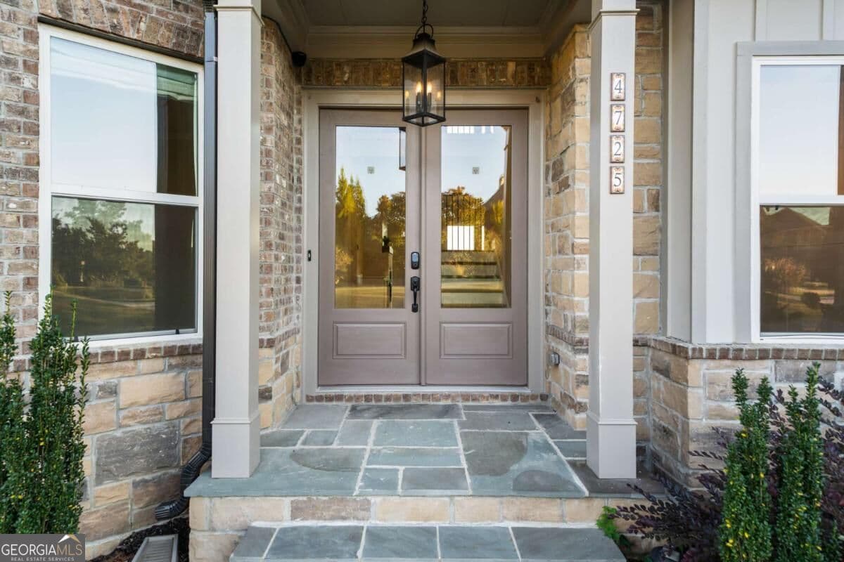5 bedroom, 4.5 bathroom, 4,004 sq ft single family residence for sale at 4725 Cardinal Ridge Way, Flowery Branch, GA 30542 — photo 2