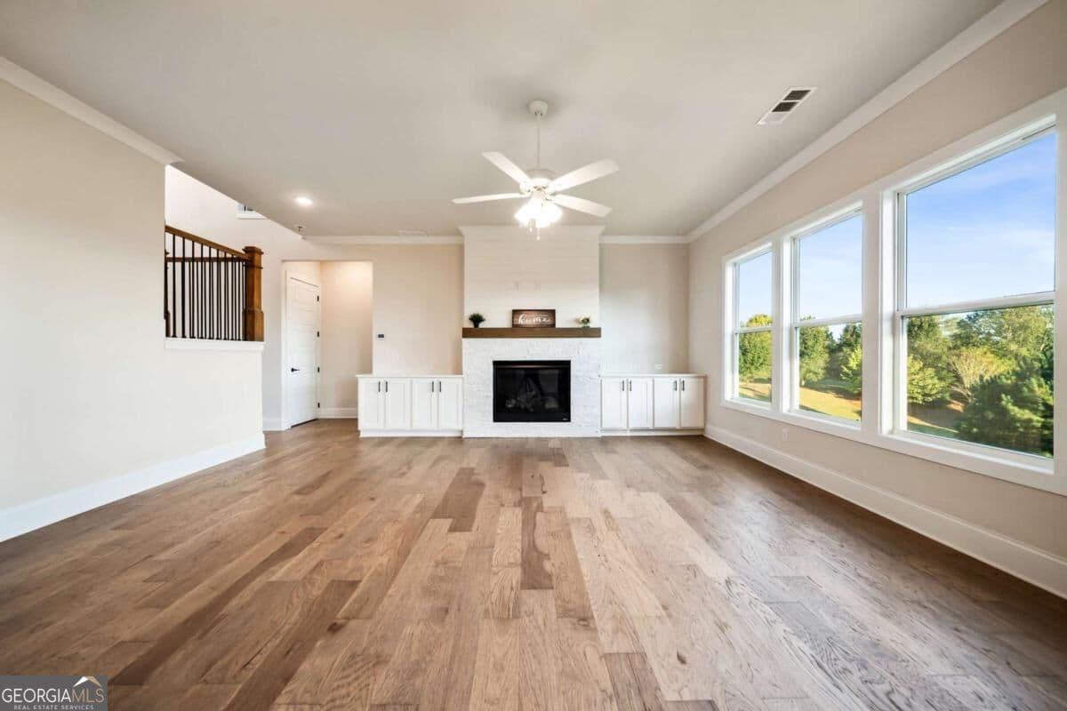 5 bedroom, 4.5 bathroom, 4,004 sq ft single family residence for sale at 4725 Cardinal Ridge Way, Flowery Branch, GA 30542 — photo 6