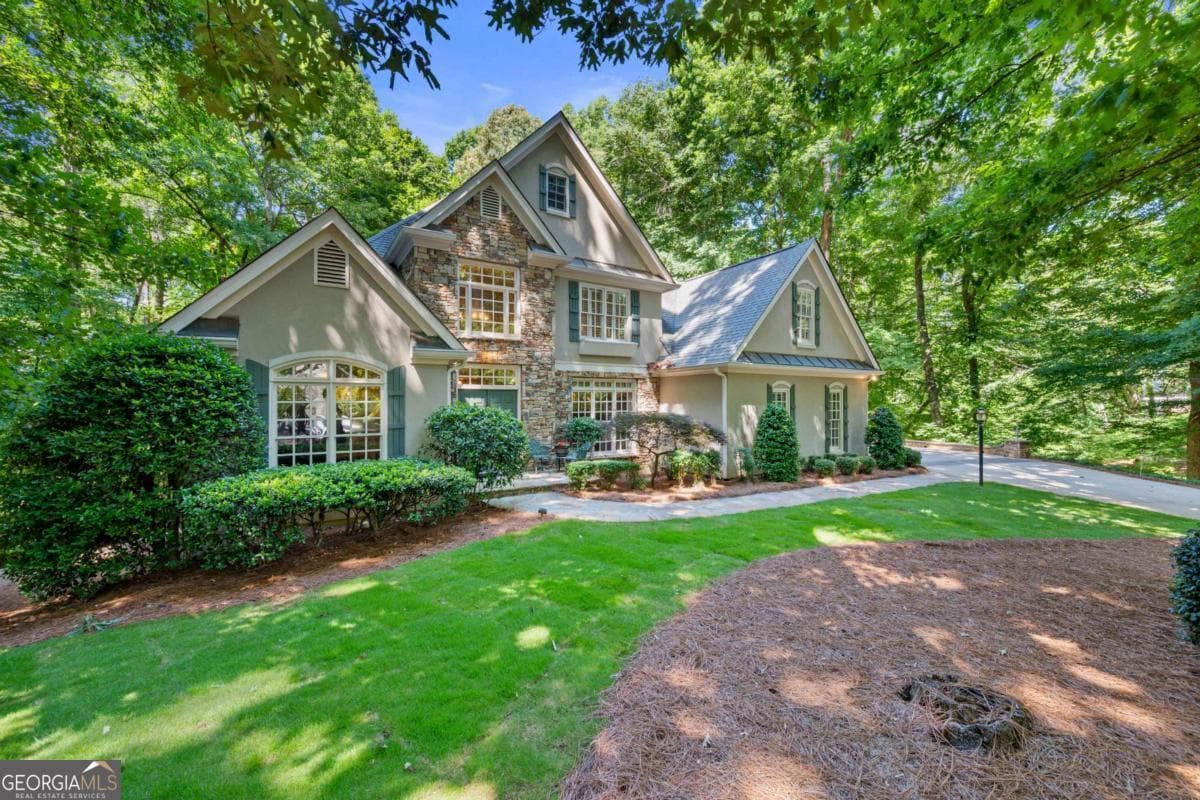 5 bedroom, 3.5 bathroom, 4,965 sq ft single family residence for sale at 2230 Fleurie Lane, Braselton, GA 30517 — photo 2