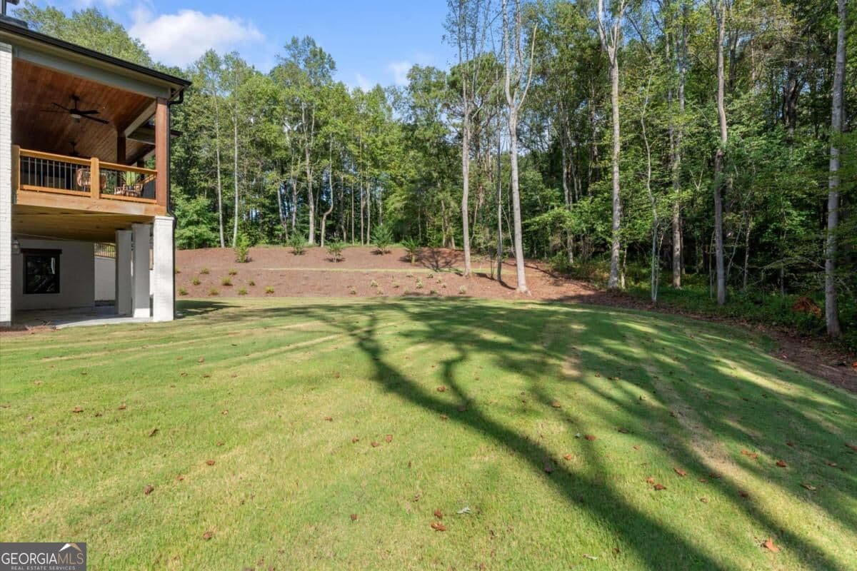 5 bedroom, 5.5 bathroom, 6,418 sq ft single family residence for sale at 422 Old Orange Mill Road, Canton, GA 30115 — photo 7