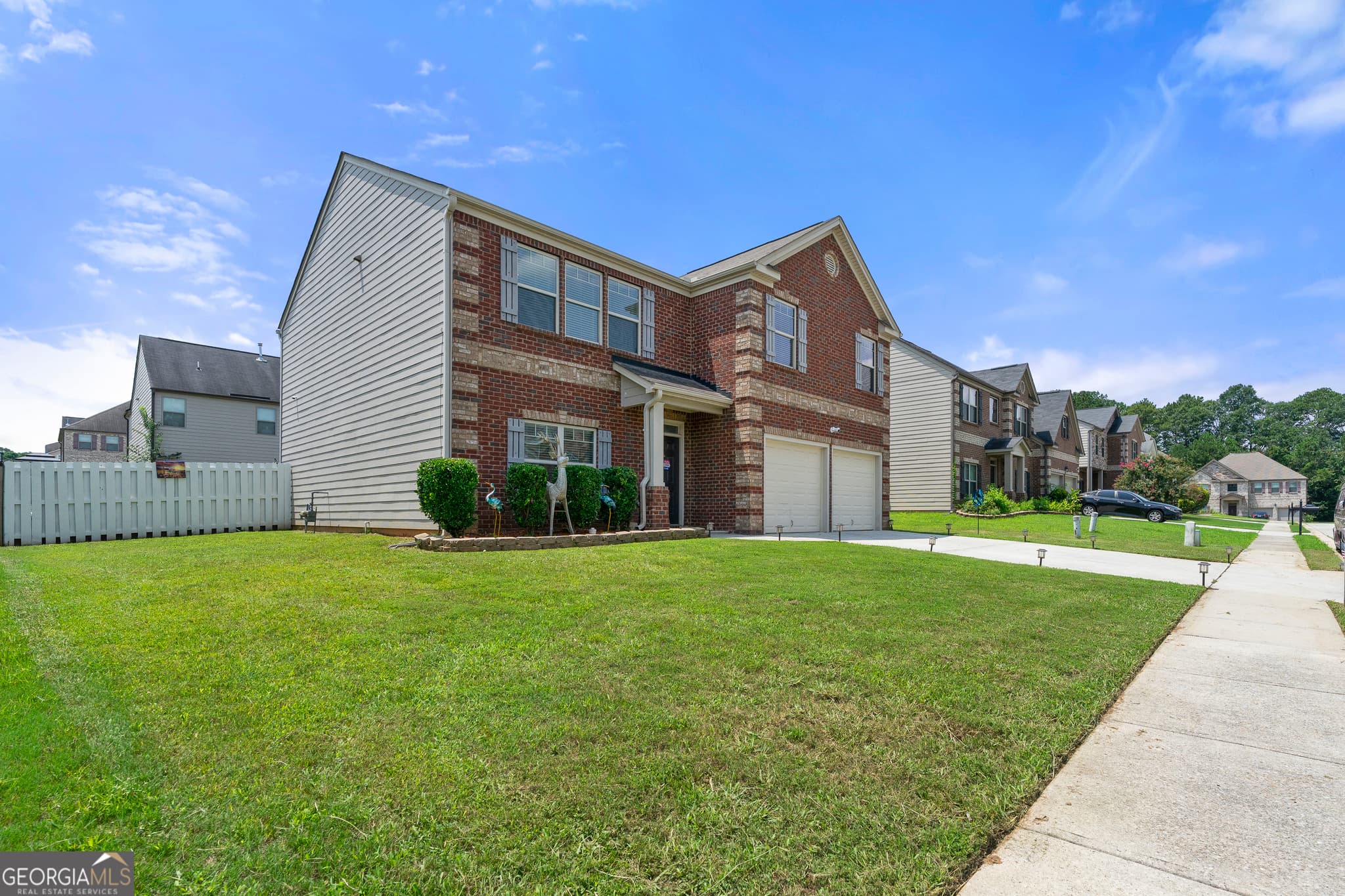 5 bedroom, 3 bathroom, 2,556 sq ft single family residence for sale at 3107 Rex Ridge Circle, Rex, GA 30273 — photo 3