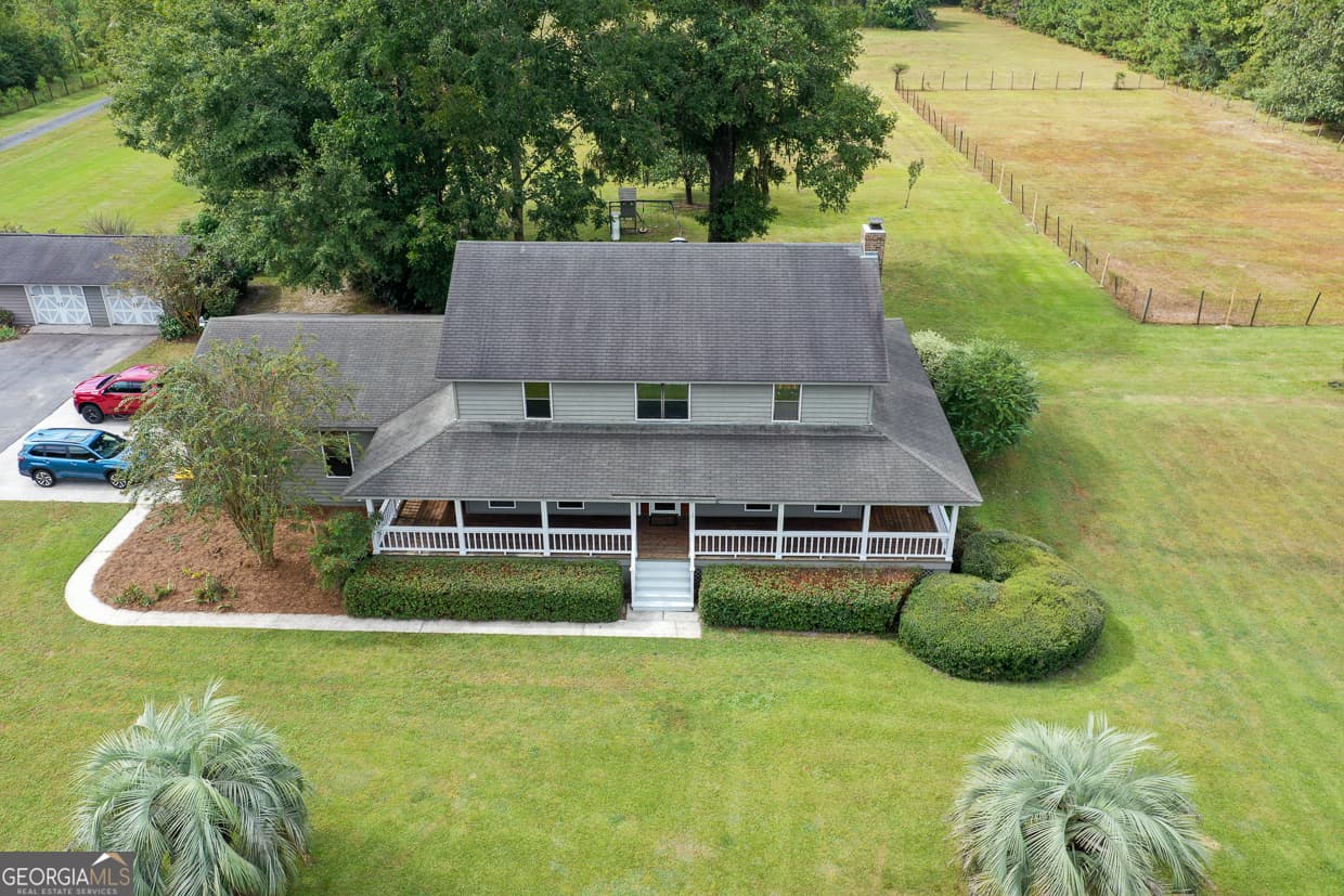 4 bedroom, 3 bathroom, 2,944 sq ft single family residence sold at 220 US 80, Ellabell, GA 31308