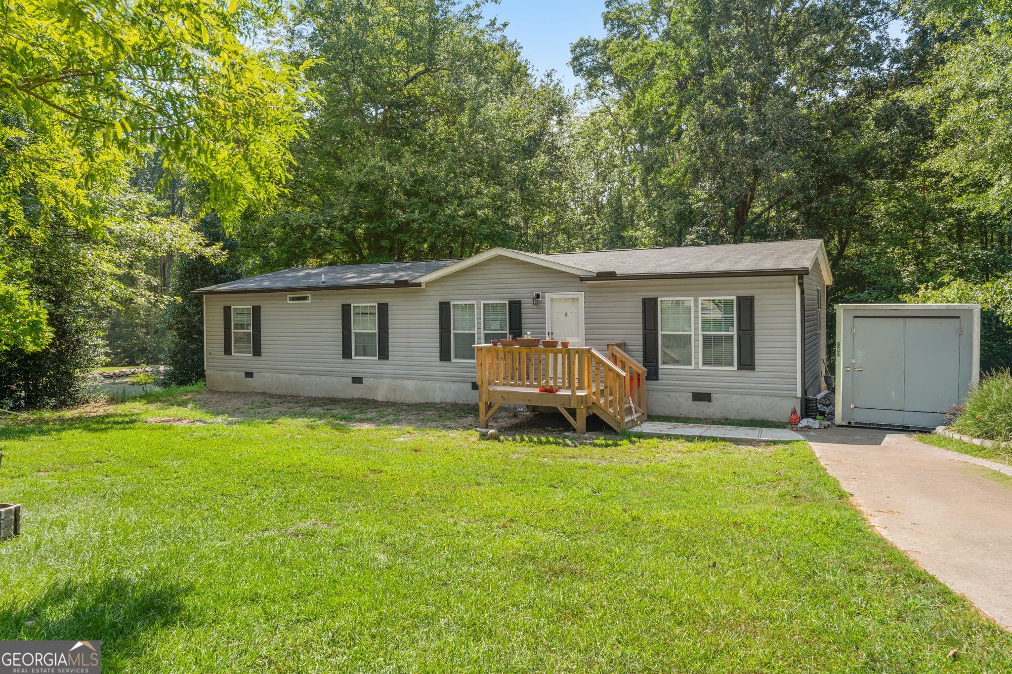 4 bedroom, 4 bathroom, 5,192 sq ft single family residence for sale at 7180 Westray Road, Cumming, GA 30028 — photo 9