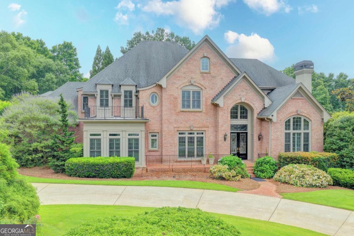 6 bedroom, 6.5 bathroom, 8,061 sq ft single family residence sold at 2320 Sugarloaf Club Drive, Duluth, GA 30097