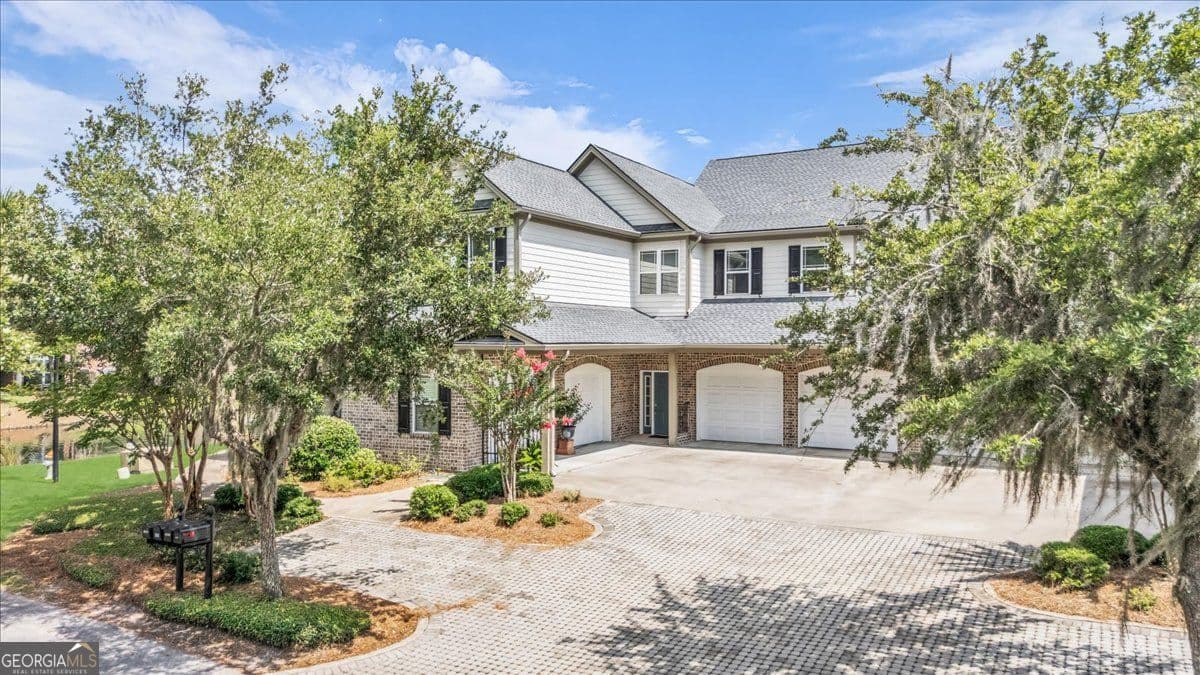 4 bedroom, 3.5 bathroom, 2,972 sq ft condominium for sale at 1003 River Oaks Drive, Richmond Hill, GA 31324 — photo 2