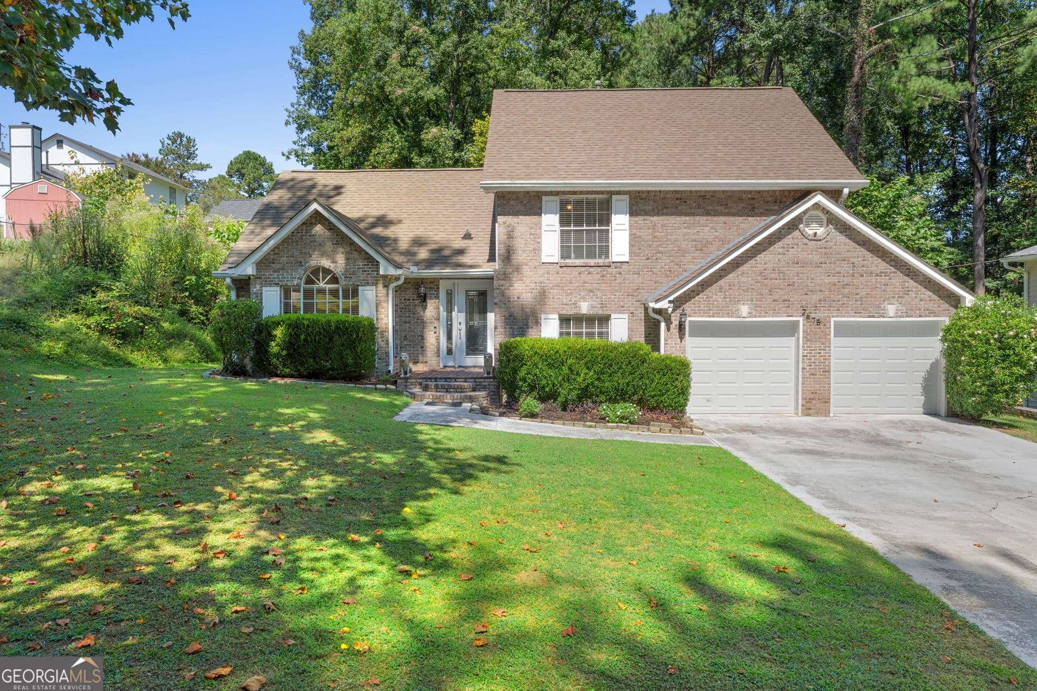 3 bedroom, 2.5 bathroom, 1,758 sq ft single family residence for sale at 2575 Ravencliff Road, Atlanta, GA 30349 — photo 1 of 42