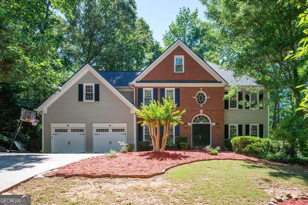 5 bedroom, 3.5 bathroom, 3,982 sq ft single family residence sold at 115 Ashewoode Downs Lane, Johns Creek, GA 30005