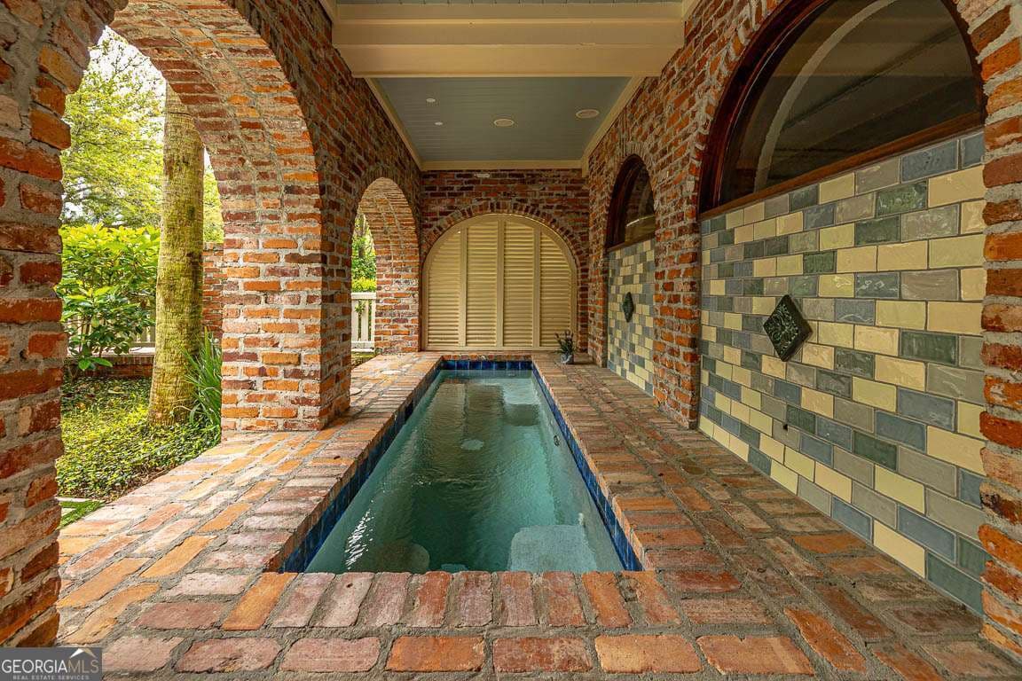4 bedroom, 4.5 bathroom, 3,570 sq ft single family residence for sale at 17 Sea Oats Lane, St. Simons, GA 31522 — photo 7