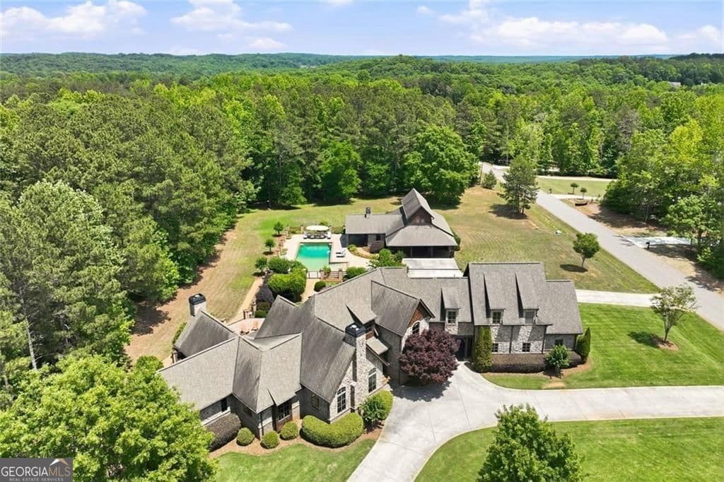 5 bedroom, 6.5 bathroom, 6,324 sq ft single family residence for sale at 605 Carriage Avenue, Jefferson, GA 30549 — photo 2