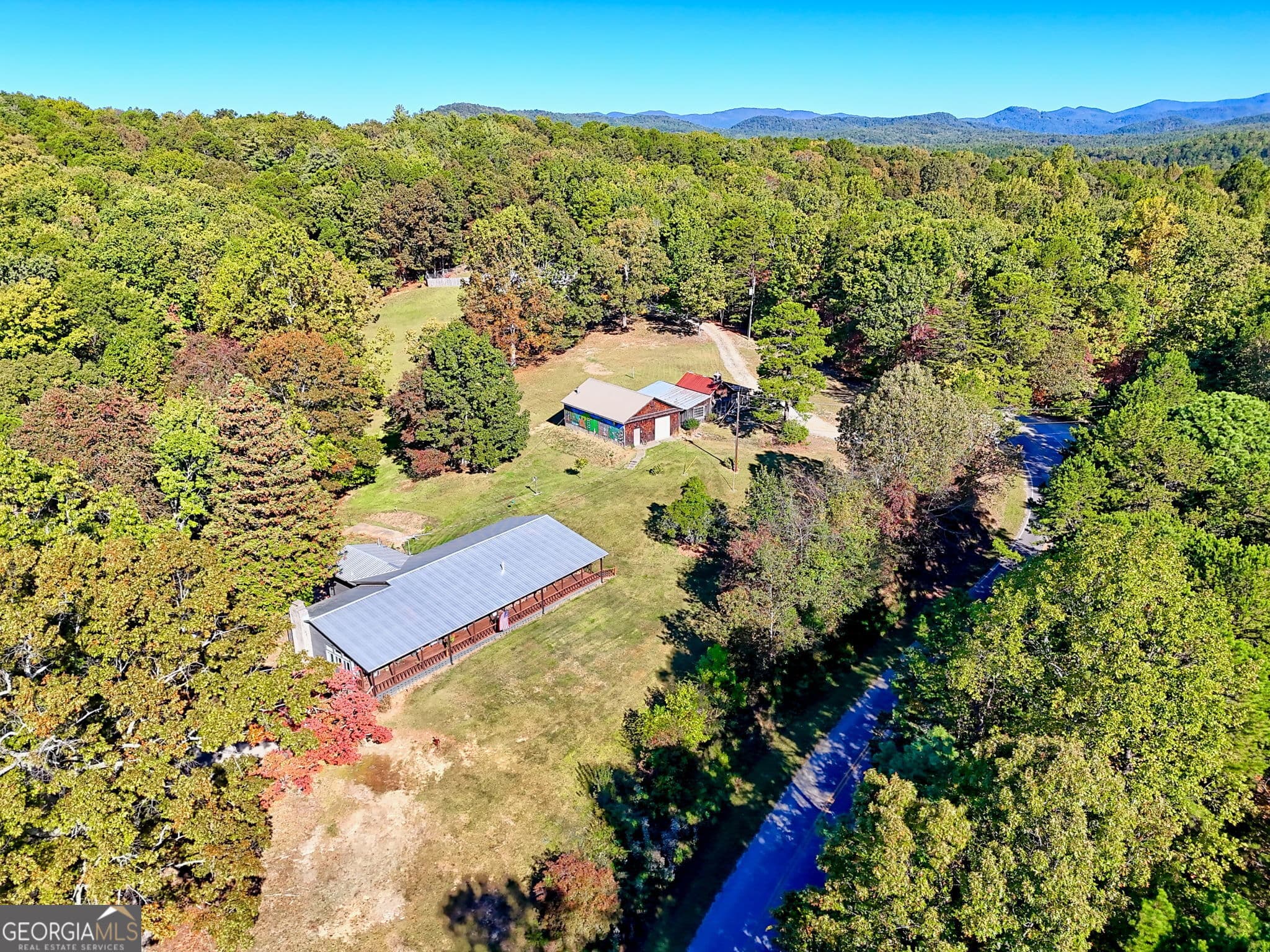4 bedroom, 1.5 bathroom, 2,298 sq ft single family residence for sale at 1994 Camp Creek Road, Lakemont, GA 30552 — photo 2