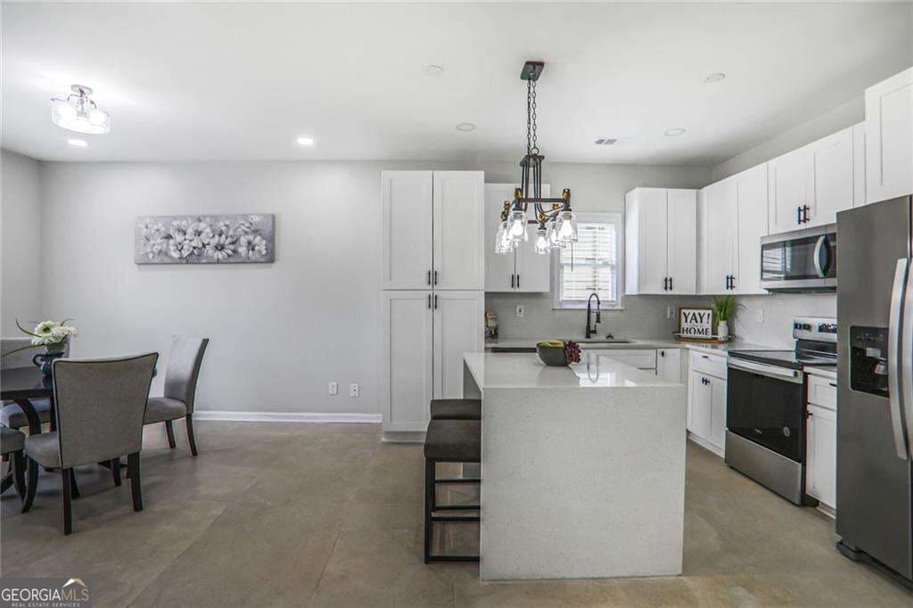 4 bedroom, 2 bathroom, 1,755 sq ft single family residence for sale at 652 Hugh Street, Atlanta, GA 30310 — photo 6