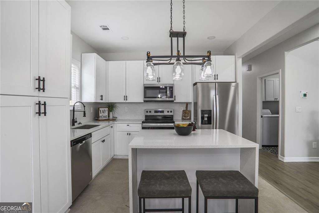 4 bedroom, 2 bathroom, 1,755 sq ft single family residence for sale at 652 Hugh Street, Atlanta, GA 30310 — photo 7