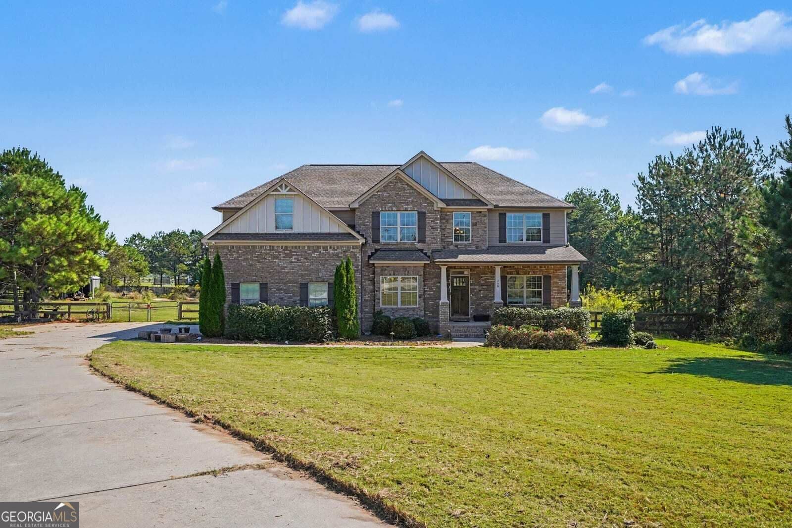 5 bedroom, 4 bathroom, 3,474 sq ft single family residence for sale at 160 Feather Lane, Jackson, GA 30233 — photo 1 of 43