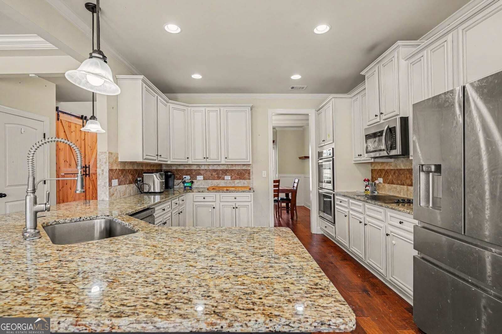 5 bedroom, 4 bathroom, 3,474 sq ft single family residence for sale at 160 Feather Lane, Jackson, GA 30233 — photo 5