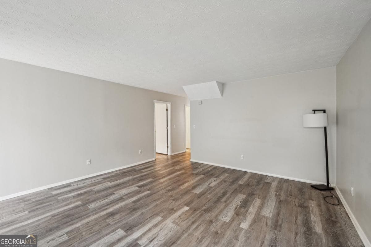 3 bedroom, 2 bathroom, 1,466 sq ft townhouse for sale at 703 Pine Tree Trail, Atlanta, GA 30349 — photo 9