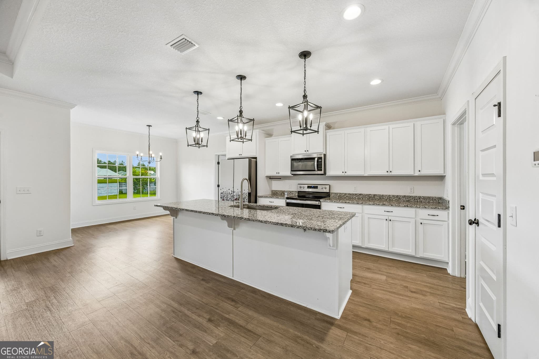 5 bedroom, 3 bathroom, 2,165 sq ft single family residence for sale at 165 Allie Loop, Brunswick, GA 31525 — photo 6