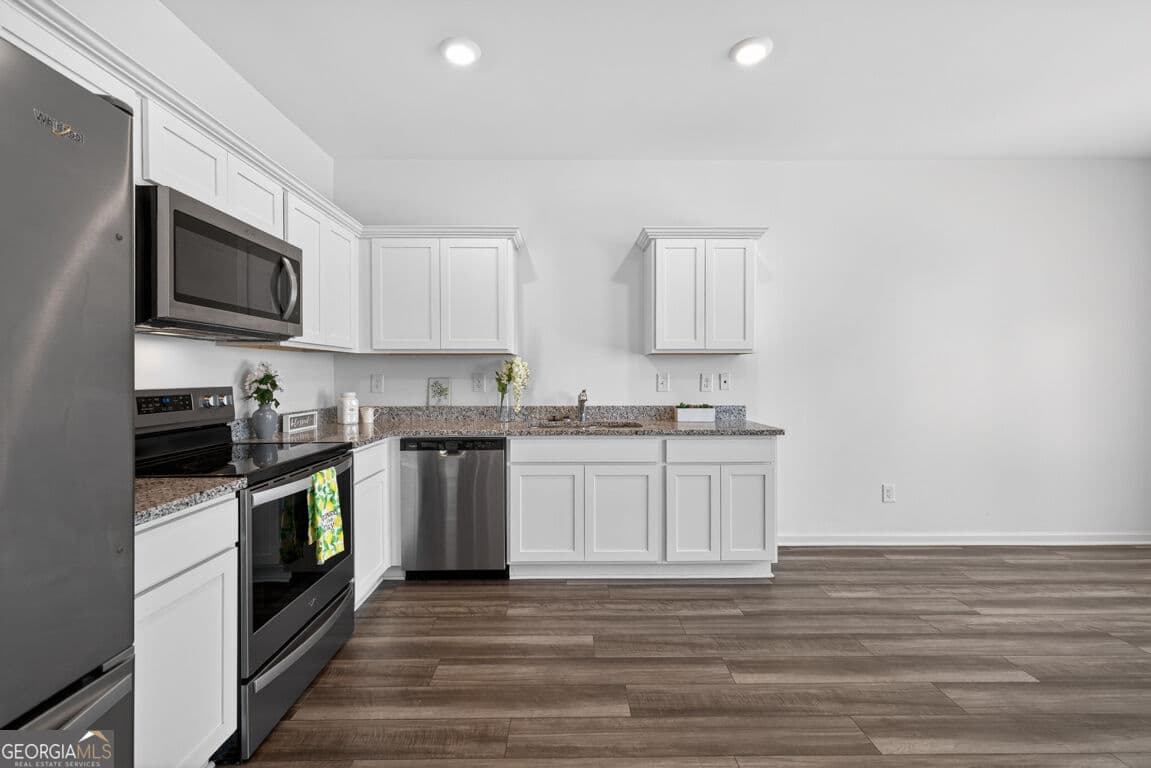 3 bedroom, 2.5 bathroom, 1,421 sq ft townhouse for sale at 64 Thetford Way, Winder, GA 30680 — photo 9