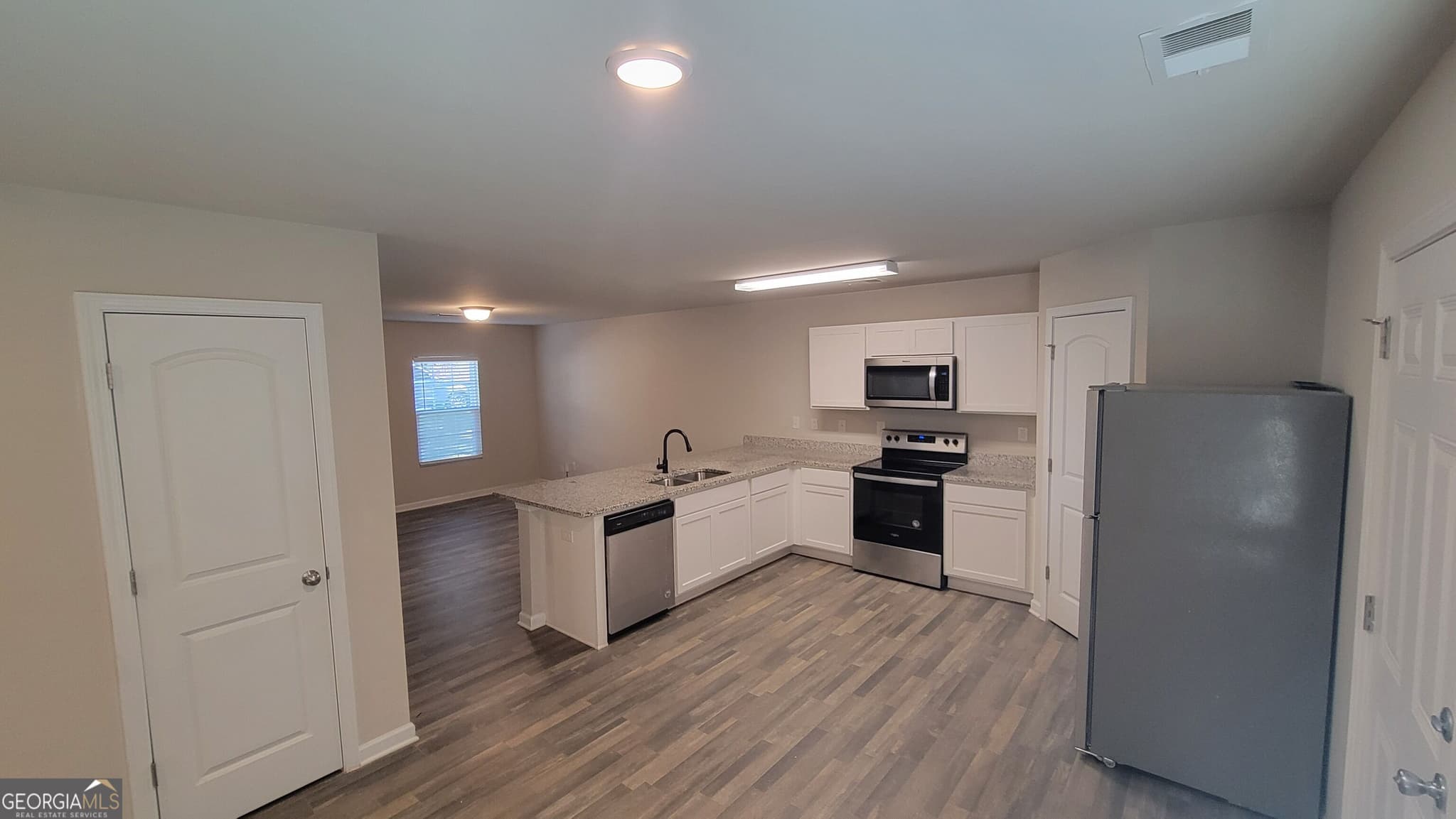 4 bedroom, 3 bathroom, 1,960 sq ft single family residence for rent at 110 Sonoma Wood Trail, Covington, GA 30016 for $2,175 a month — photo 3