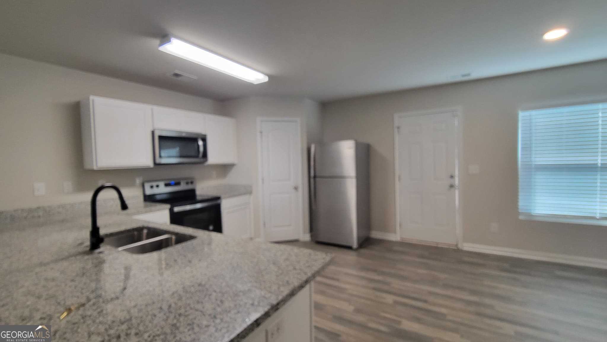 4 bedroom, 3 bathroom, 1,960 sq ft single family residence for rent at 110 Sonoma Wood Trail, Covington, GA 30016 for $2,175 a month — photo 4