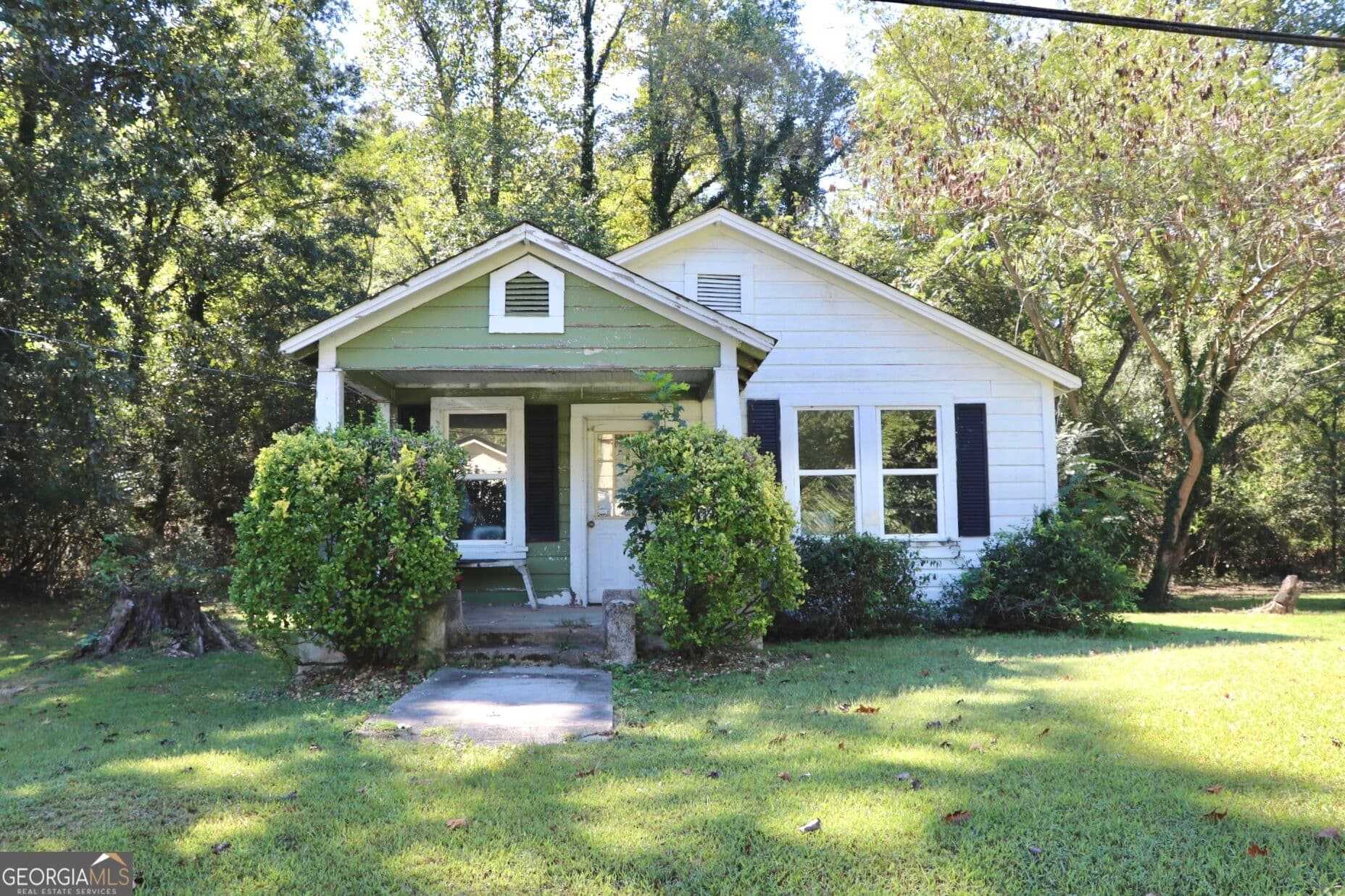 2 bedroom, 1 bathroom, 768 sq ft single family residence for sale at 121 McKenzie Avenue, Summerville, GA 30747 — photo 2
