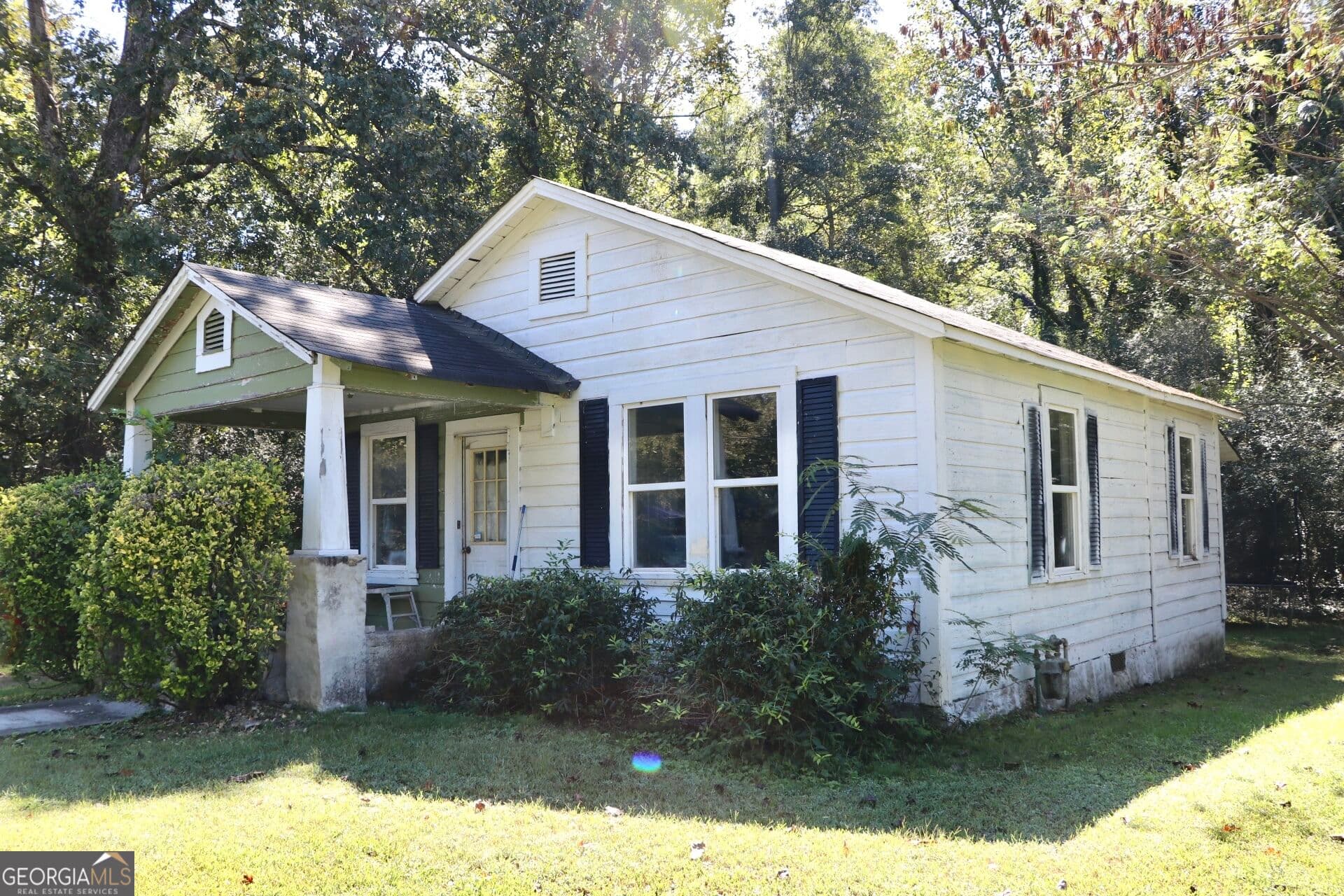 2 bedroom, 1 bathroom, 768 sq ft single family residence for sale at 121 McKenzie Avenue, Summerville, GA 30747 — photo 4