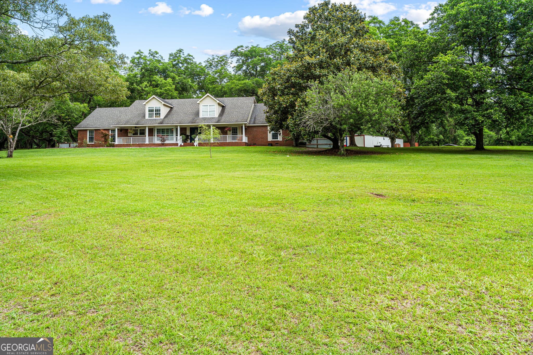 6 bedroom, 4 bathroom, 4,328 sq ft single family residence for sale at 300 GA Highway 42, Byron, GA 31008 — photo 4