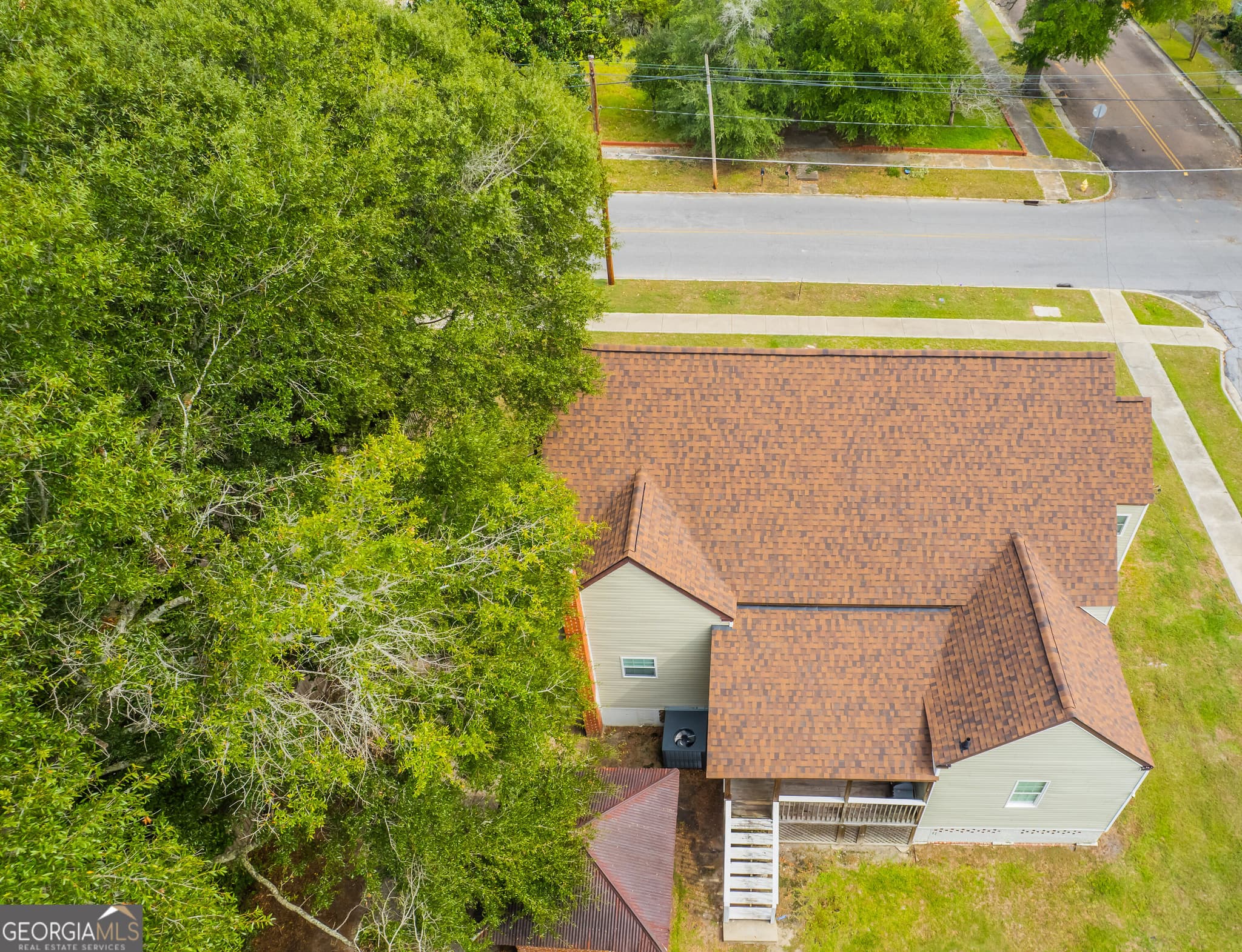 4 bedroom, 3 bathroom, 1,980 sq ft single family residence for sale at 407 Harvey Street, Millen, GA 30442 — photo 2