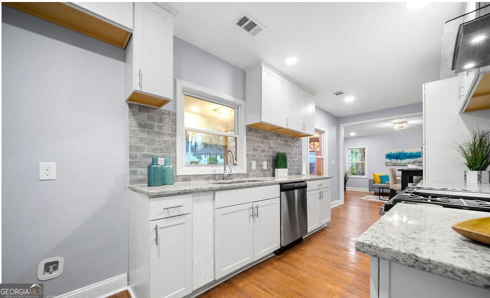 5 bedroom, 3 bathroom, 2,004 sq ft single family residence for sale at 2319 Beecher Road, Atlanta, GA 30311 — photo 5