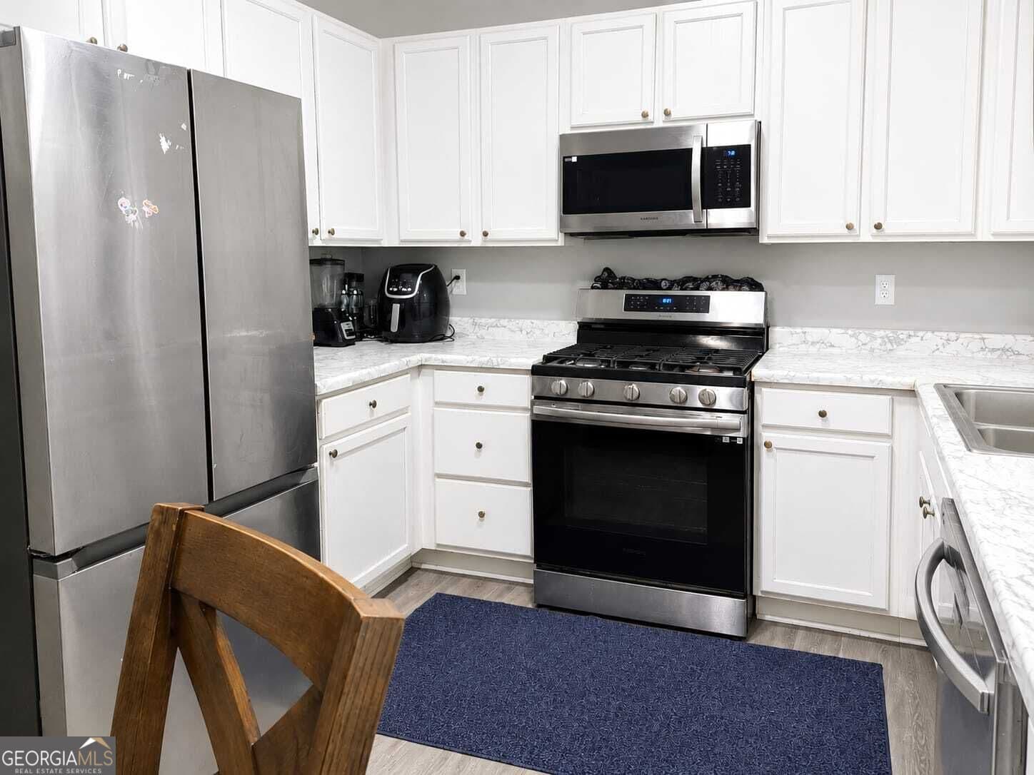 4 bedroom, 2.5 bathroom, 200 sq ft single family residence for sale at 220 Copperbend Drive, Austell, GA 30168 — photo 7