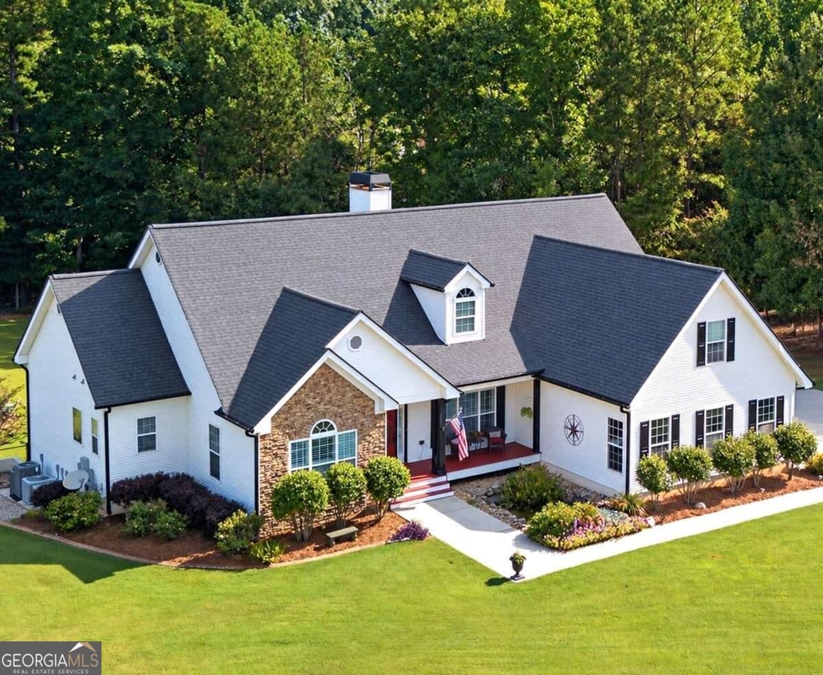 4 bedroom, 4.5 bathroom, 4,706 sq ft single family residence for sale at 193 Swanson Road, Fayetteville, GA 30214 — photo 1 of 75