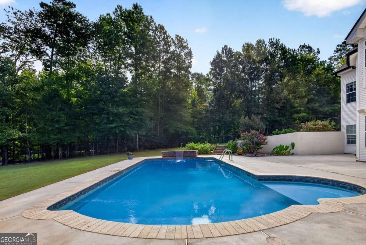4 bedroom, 4.5 bathroom, 4,706 sq ft single family residence for sale at 193 Swanson Road, Fayetteville, GA 30214 — photo 4