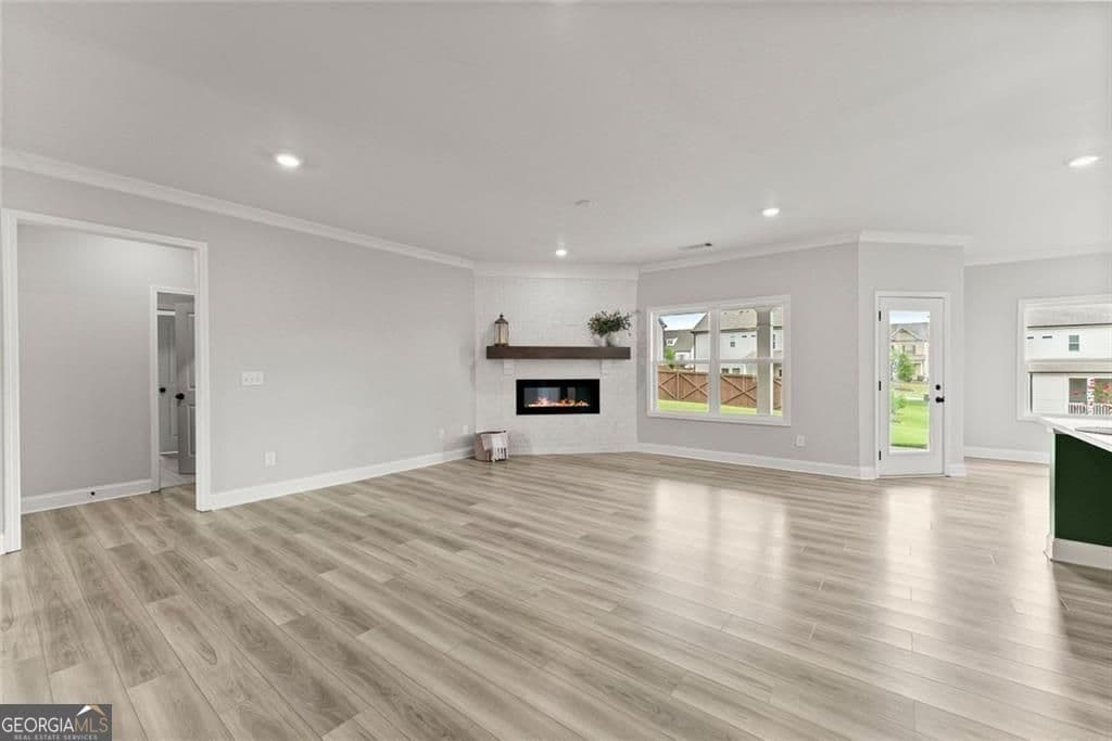 4 bedroom, 3 bathroom, 2,300 sq ft single family residence for sale at 7125 Birch View Court, Flowery Branch, GA 30542 — photo 6