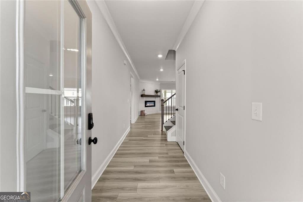 4 bedroom, 3 bathroom, 2,300 sq ft single family residence for sale at 7125 Birch View Court, Flowery Branch, GA 30542 — photo 4