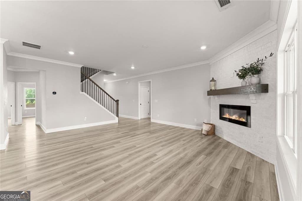 4 bedroom, 3 bathroom, 2,300 sq ft single family residence for sale at 7125 Birch View Court, Flowery Branch, GA 30542 — photo 8