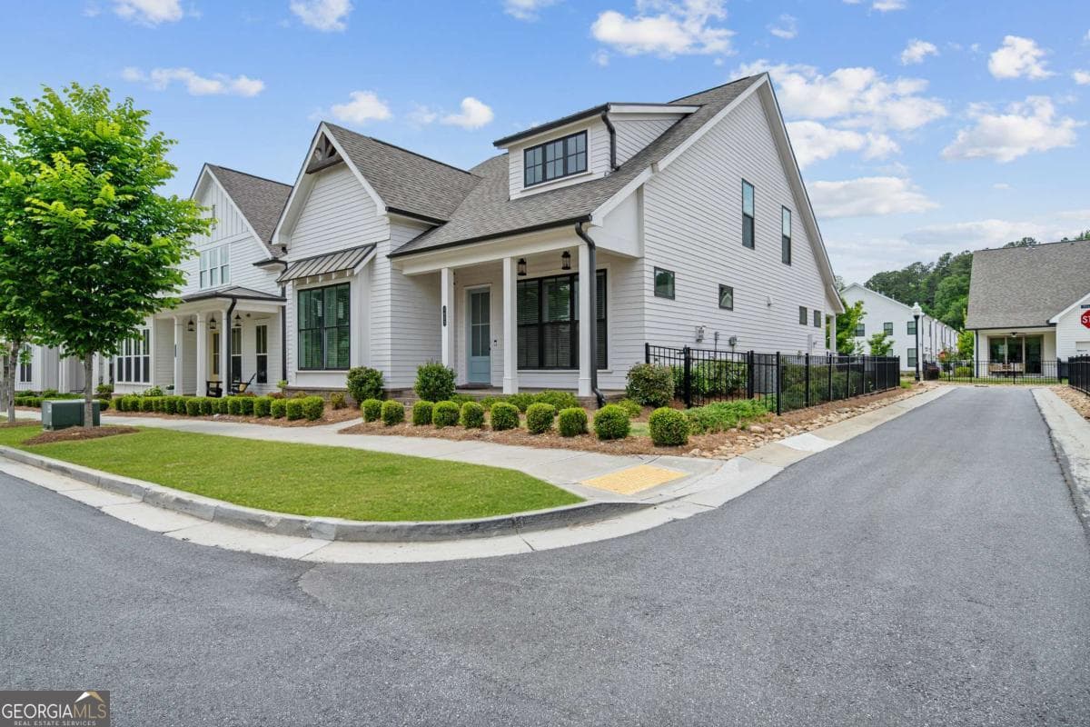 3 bedroom, 2.5 bathroom, 2,018 sq ft single family residence sold at 1053 Harvest Park Lane, Suwanee, GA 30024