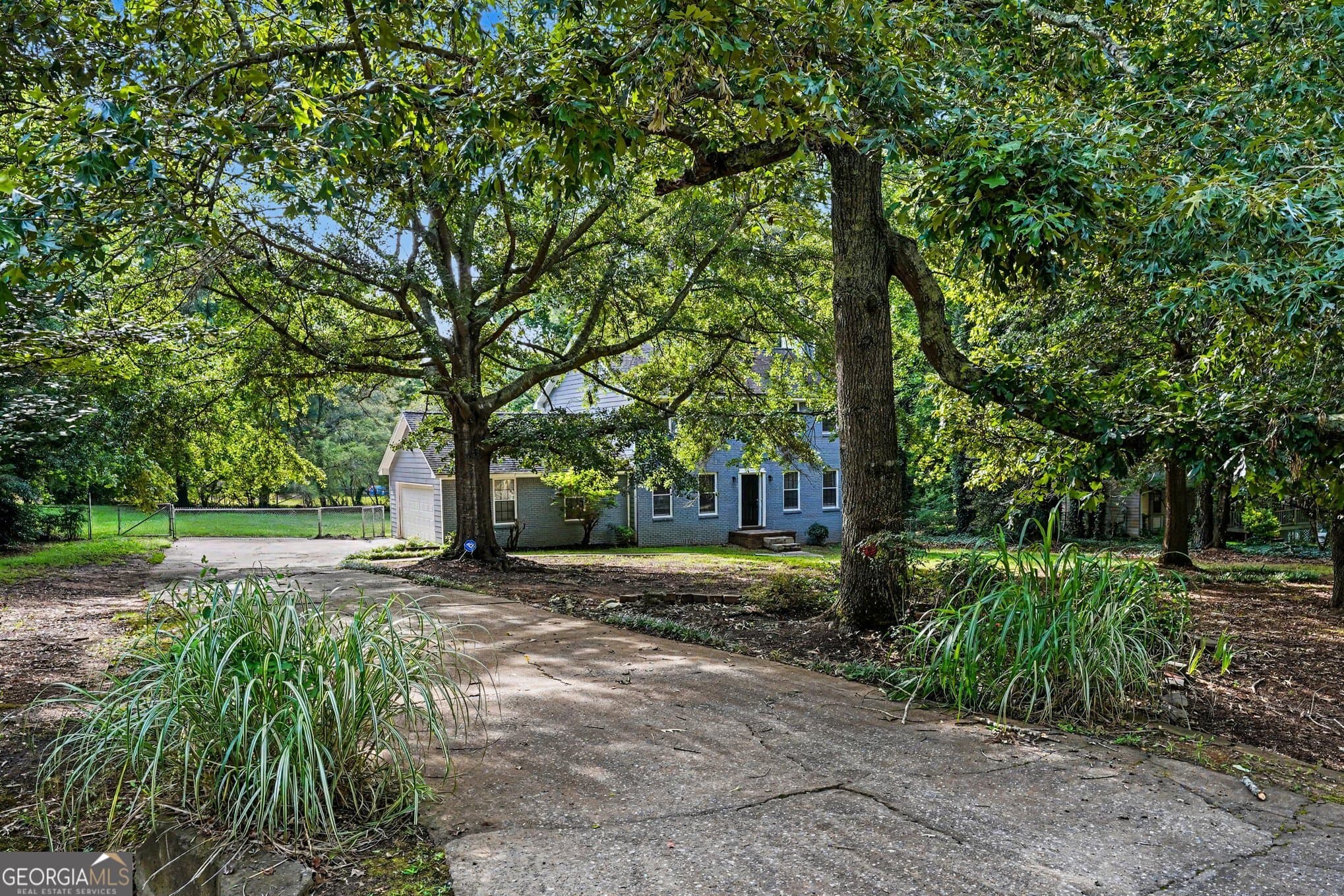4 bedroom, 2.5 bathroom, 1,731 sq ft single family residence for sale at 1304 Oakwood Road, Jonesboro, GA 30236 — photo 2