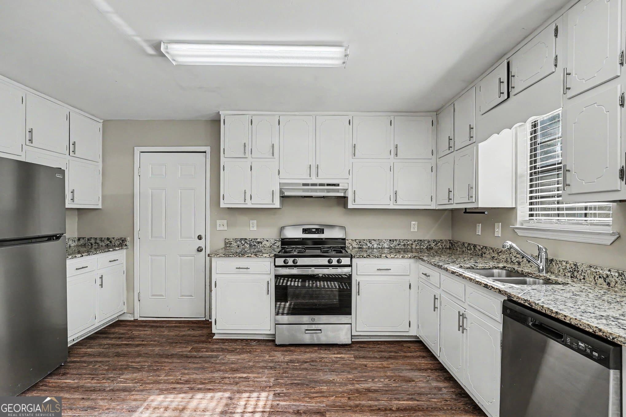 4 bedroom, 2.5 bathroom, 1,731 sq ft single family residence for sale at 1304 Oakwood Road, Jonesboro, GA 30236 — photo 9