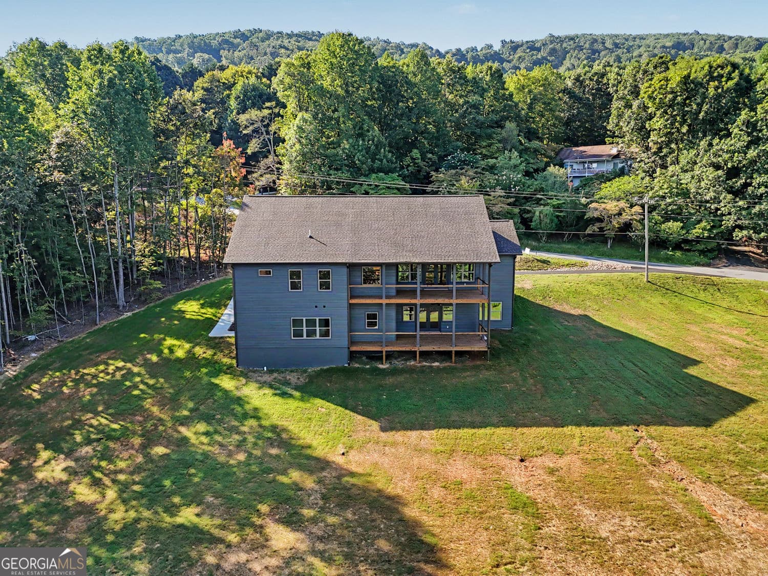 4 bedroom, 4 bathroom, 3,200 sq ft single family residence for sale at 1306 Ramey Mtn Road, Hiawassee, GA 30546 — photo 3