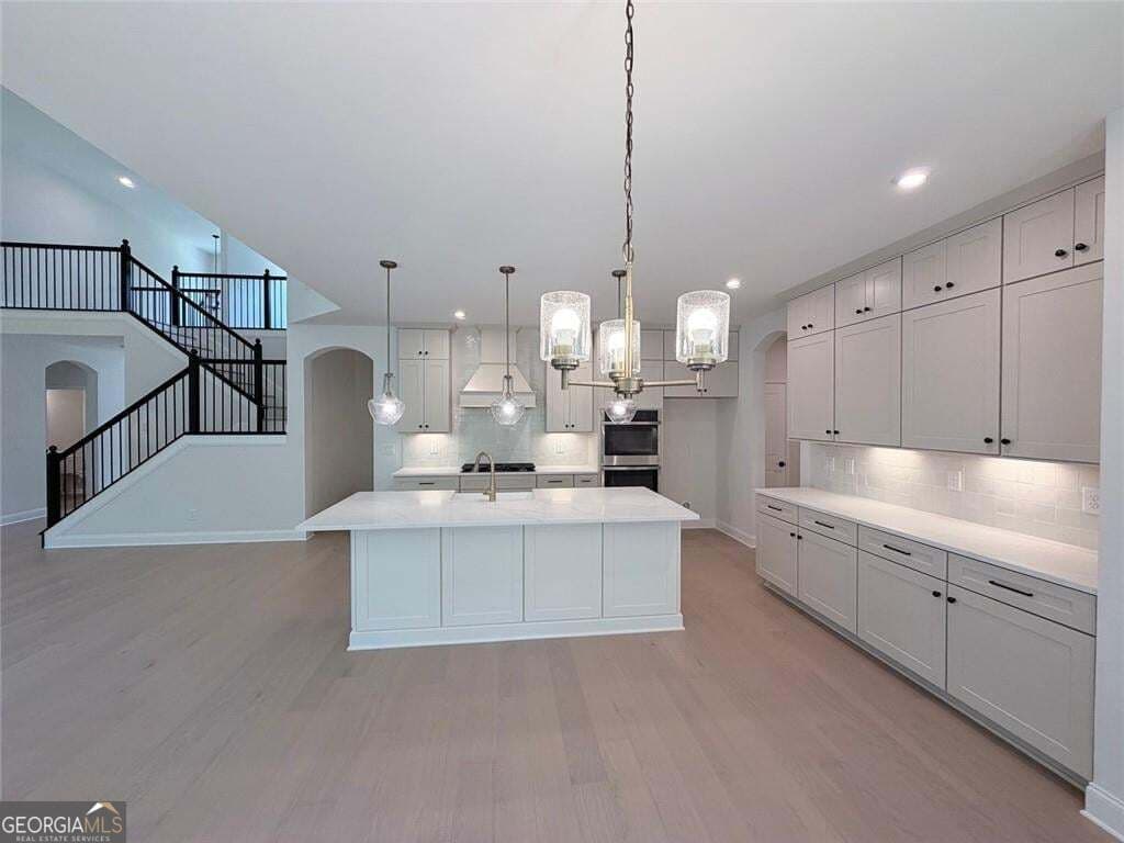 5 bedroom, 3.5 bathroom, 3,640 sq ft single family residence for sale at 167 Wood Grove Lane, Canton, GA 30114 — photo 3